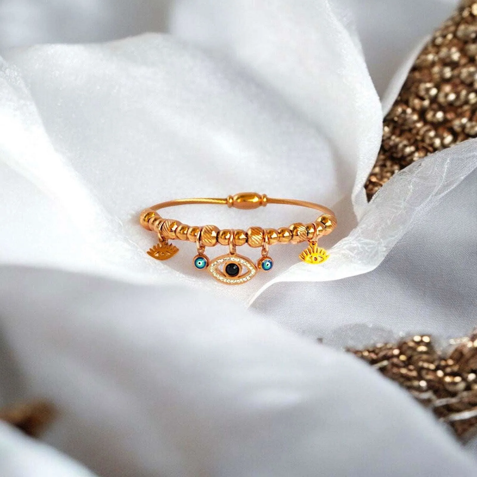 Rose Gold Evil Eye Sunburst Charms Bracelet